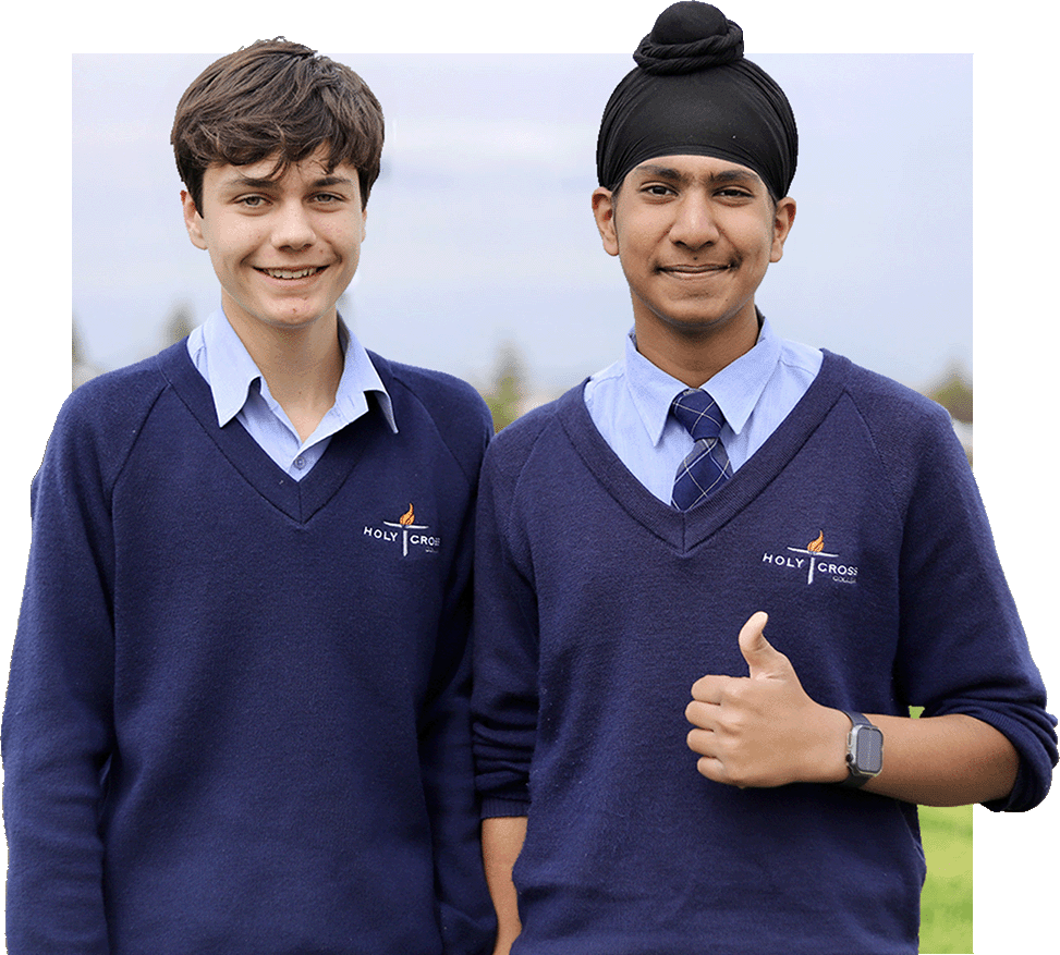 Two male students smiling at the camera.